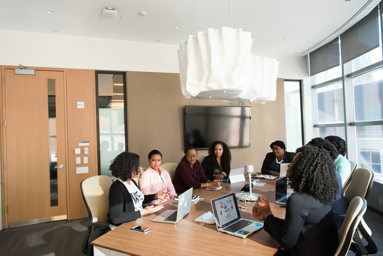 Advocates in boardroom discussion