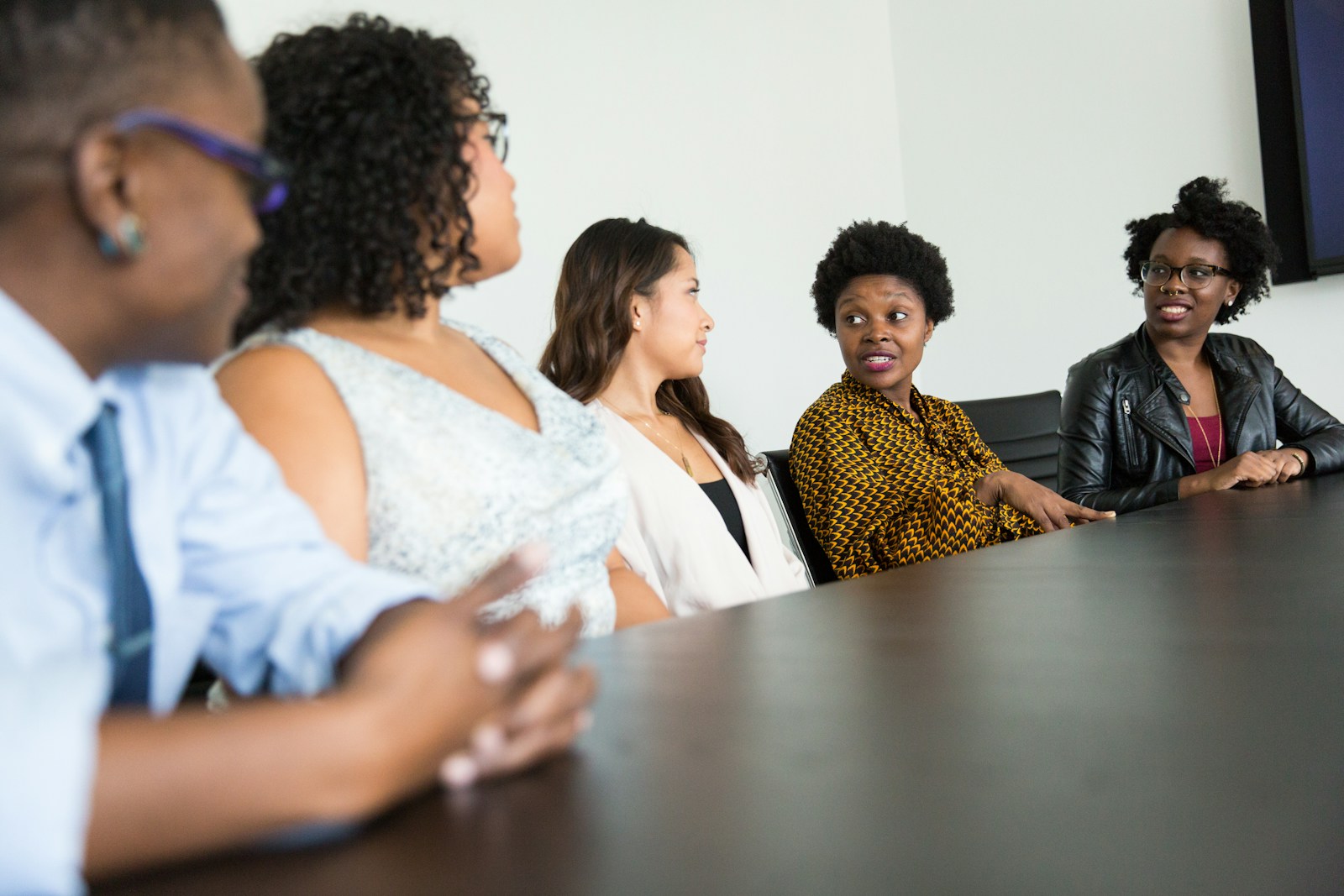 Panel discussion at conference table